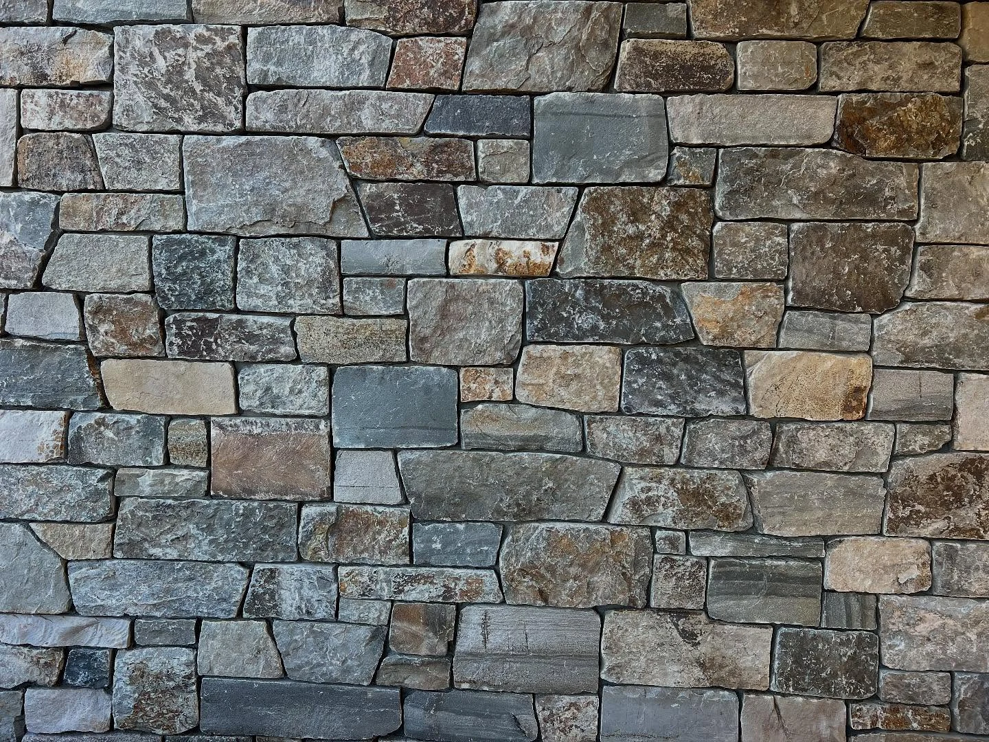 Close-up of the stone and finished joints in an Alano Masonry wall