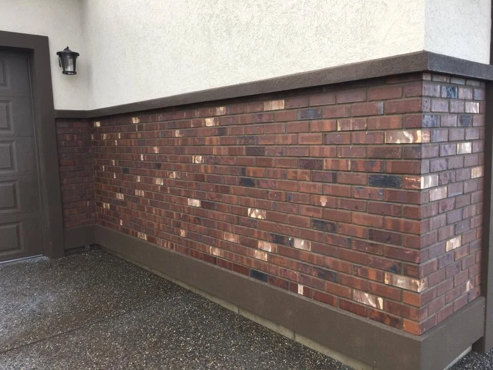 Alano Masonry brick veneer wrapping the corner of a building